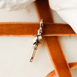 Christo Winding Key Charm