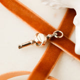 Christo Winding Key Charm